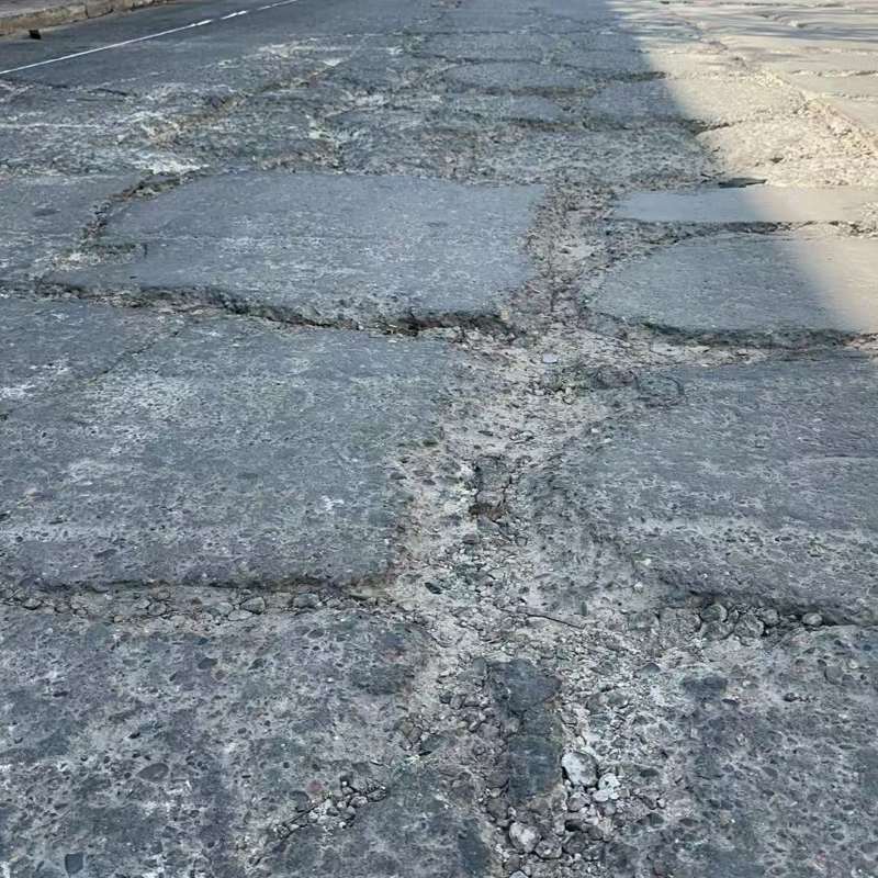 新荣路面起砂露石子修补料